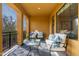 Relaxing covered balcony with stylish seating and views of the desert landscape at 20750 N 87Th St # 2074, Scottsdale, AZ 85255
