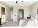 Well-lit bedroom featuring access to a balcony, ensuite bathroom, and neutral color palette at 20750 N 87Th St # 2074, Scottsdale, AZ 85255