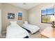 Bright bedroom with twin beds, large windows, and a serene atmosphere at 20750 N 87Th St # 2074, Scottsdale, AZ 85255