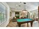 Community game room featuring a pool table, seating, and a television at 20750 N 87Th St # 2074, Scottsdale, AZ 85255
