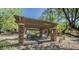 Outdoor picnic area with stone pillars and grill under a wooden pergola at 20750 N 87Th St # 2074, Scottsdale, AZ 85255