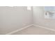 Neutral bedroom with two windows at 21130 N 58Th St, Phoenix, AZ 85054