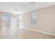 Bright living room featuring tile flooring, recessed lighting, and a sliding glass door to the outside at 21130 N 58Th St, Phoenix, AZ 85054
