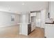 Bright and airy living space adjacent to a modern kitchen, perfect for entertaining and daily living at 21130 N 58Th St, Phoenix, AZ 85054