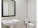 Powder room with pedestal sink and toilet at 21130 N 58Th St, Phoenix, AZ 85054