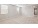 Bedroom featuring plush carpeting and two modern windows with bright natural light at 21240 N 58Th St, Phoenix, AZ 85054