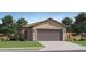 Charming single-story home featuring a two-car garage, desert landscaping, and a welcoming entrance at 25069 N 174Th Ln, Surprise, AZ 85387
