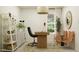 Modern office with bright natural light, stylish furniture, and cozy vibe at 25069 N 174Th Ln, Surprise, AZ 85387
