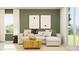 Cozy living room with stylish decor, a comfortable sofa, and bright natural light at 25069 N 174Th Ln, Surprise, AZ 85387