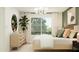 Cozy bedroom featuring large window, modern decor, and neutral color palette at 25069 N 174Th Ln, Surprise, AZ 85387