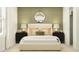 The main bedroom contains a decorative mirror, lamps, and neutral color palette at 25069 N 174Th Ln, Surprise, AZ 85387