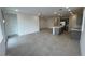 Open concept kitchen with an island, gray cabinets, tiled flooring, and recessed lighting at 25170 W Wayland Dr, Buckeye, AZ 85326