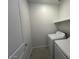 Functional laundry room showcasing a washing machine and a dryer, optimized for space and efficiency at 25170 W Wayland Dr, Buckeye, AZ 85326