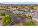 Scenic aerial view of a residential neighborhood featuring well-maintained homes, lush greenery, and peaceful cul-de-sacs at 2742 W Monterey Pl, Chandler, AZ 85224