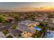 Stunning aerial view of home with pool, basketball court, and manicured landscaping at sunset at 2742 W Monterey Pl, Chandler, AZ 85224