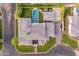 Overhead aerial view showcasing a home with pool, sport court, lush landscaping, and meticulously designed outdoor living spaces at 2742 W Monterey Pl, Chandler, AZ 85224