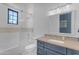 Bright bathroom featuring subway tiles, stylish vanity with sink, and glass-enclosed shower for a modern aesthetic at 2742 W Monterey Pl, Chandler, AZ 85224