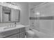Bright bathroom features modern fixtures, vanity, and a shower-tub combination at 2742 W Monterey Pl, Chandler, AZ 85224