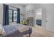 Cozy bedroom with window view, wall art, and easy access to en-suite bathroom, offers comfortable living at 2742 W Monterey Pl, Chandler, AZ 85224
