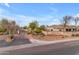 Welcoming entrance to Cayley Manor, featuring lush landscaping and a secure gated entry for residents at 2742 W Monterey Pl, Chandler, AZ 85224