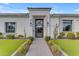 Striking front exterior showcasing modern architectural details and manicured landscaping at 2742 W Monterey Pl, Chandler, AZ 85224