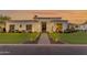 Elegant front exterior with manicured landscaping, modern design, and unique front door at 2742 W Monterey Pl, Chandler, AZ 85224