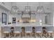 Spacious kitchen with a large central island, pendant lighting, and stainless steel appliances at 2742 W Monterey Pl, Chandler, AZ 85224