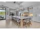 Gourmet kitchen featuring a large center island with seating, pendant lighting, and modern appliances at 2742 W Monterey Pl, Chandler, AZ 85224