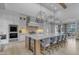 Gourmet kitchen featuring a large center island with seating, modern appliances, and pendant lights at 2742 W Monterey Pl, Chandler, AZ 85224