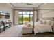 Spacious main bedroom features 4-poster bed, sitting area, and sliding glass doors opening to the backyard at 2742 W Monterey Pl, Chandler, AZ 85224