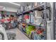 Well-organized storage room with shelves and bins for optimal organization at 2742 W Monterey Pl, Chandler, AZ 85224