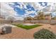 Large backyard featuring low maintenance landscaping, patio, and mature desert landscaping at 30303 W Whitton Ave, Buckeye, AZ 85396