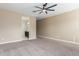 Expansive carpeted bedroom featuring an ensuite bathroom with a modern vanity at 30303 W Whitton Ave, Buckeye, AZ 85396