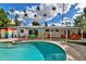 Inviting backyard showcases a refreshing pool, outdoor dining, and seating areas, perfect for entertaining and relaxation at 4134 N 35Th St, Phoenix, AZ 85018