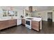 Bright kitchen with stainless steel appliances, modern cabinetry, and a breakfast bar with access to other rooms at 4134 N 35Th St, Phoenix, AZ 85018