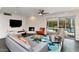 Cozy living room with a fireplace, stylish furniture, and sliding doors that lead to a backyard with a pool at 4134 N 35Th St, Phoenix, AZ 85018