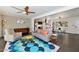 Stylish living room featuring modern furnishings, a colorful rug, and an open layout connected to the kitchen at 4134 N 35Th St, Phoenix, AZ 85018