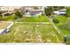 Drone shot of a house with a large, fenced yard providing ample space and privacy at 4211 W Yorkshire Dr, Glendale, AZ 85308