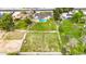 Aerial photo showcases a fenced plot, adjacent to the home, with plenty of room to roam at 4211 W Yorkshire Dr, Glendale, AZ 85308