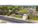 Wide aerial view of the property highlighting its spacious yard, location, and proximity to the street at 4211 W Yorkshire Dr, Glendale, AZ 85308