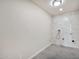 Laundry room with modern tile and utility hookup at 4211 W Yorkshire Dr, Glendale, AZ 85308