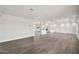 Bright and airy living room area with gray tile flooring and white walls at 4211 W Yorkshire Dr, Glendale, AZ 85308