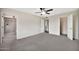 Bright main bedroom with an ensuite bathroom and large closet at 4211 W Yorkshire Dr, Glendale, AZ 85308