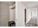 Walk-in closet with vinyl floors and built-in shelves at 4211 W Yorkshire Dr, Glendale, AZ 85308