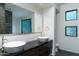 Bathroom with double vanity, vessel sinks, modern fixtures, and minimalist design at 4550 E Foothill Dr, Paradise Valley, AZ 85253