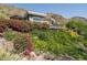Elegant home nestled amidst lush landscaping and natural surroundings, offering privacy and serene beauty at 4550 E Foothill Dr, Paradise Valley, AZ 85253