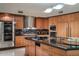 Modern kitchen featuring custom cabinets, stainless steel appliances and lots of counterspace at 4550 E Foothill Dr, Paradise Valley, AZ 85253