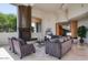 Elegant living room featuring high ceilings, a fireplace, and large windows, perfect for entertaining at 4550 E Foothill Dr, Paradise Valley, AZ 85253