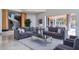 Stylish living room with designer sofas, a modern coffee table, and bright, natural light at 4550 E Foothill Dr, Paradise Valley, AZ 85253