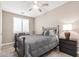 Charming bedroom showcasing natural light, comfortable bed, and a relaxing ambiance at 4846 E Piccadilly Rd, Phoenix, AZ 85018